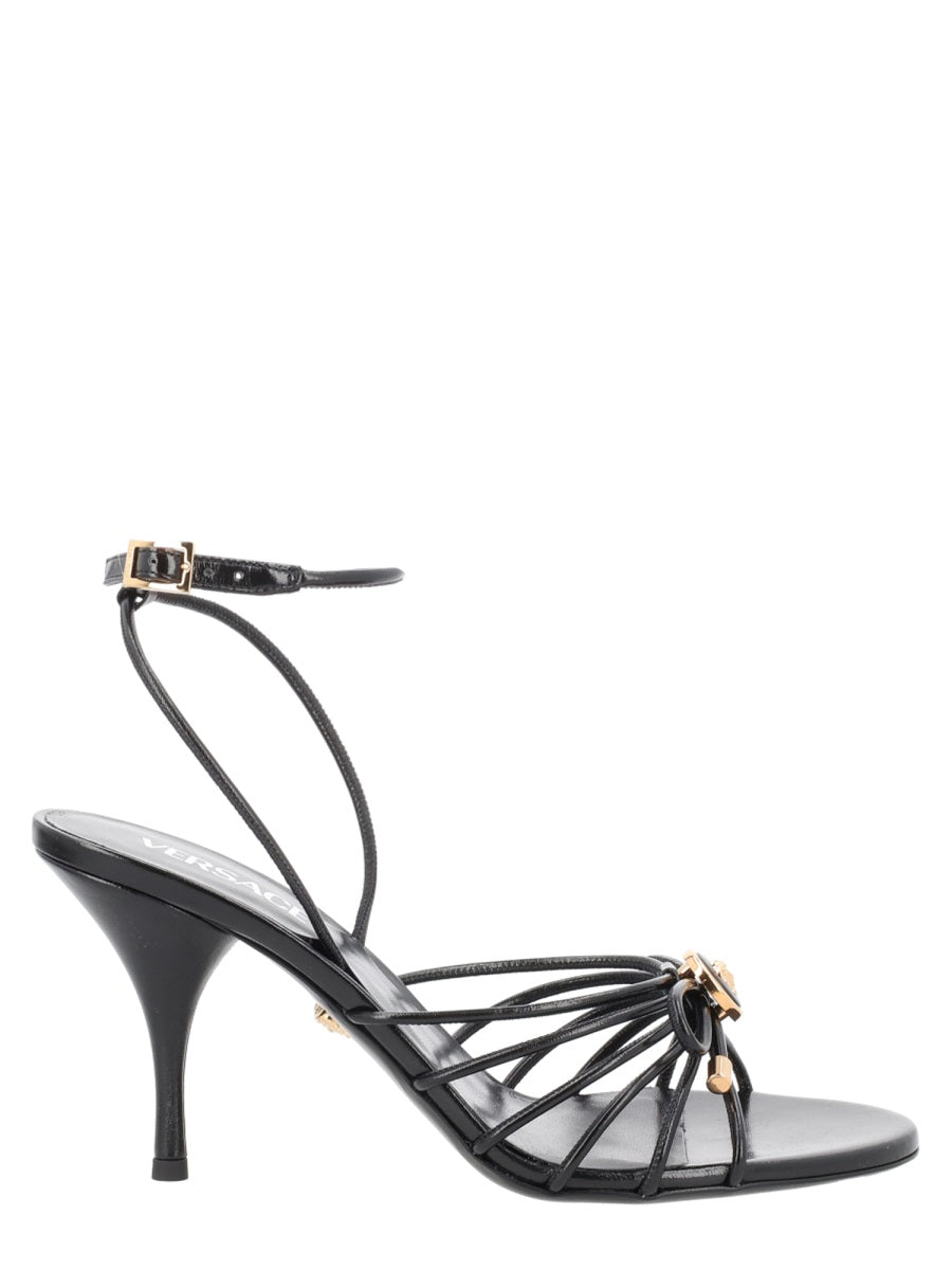 Opera Bow Gold-Tone Emblem Sandals